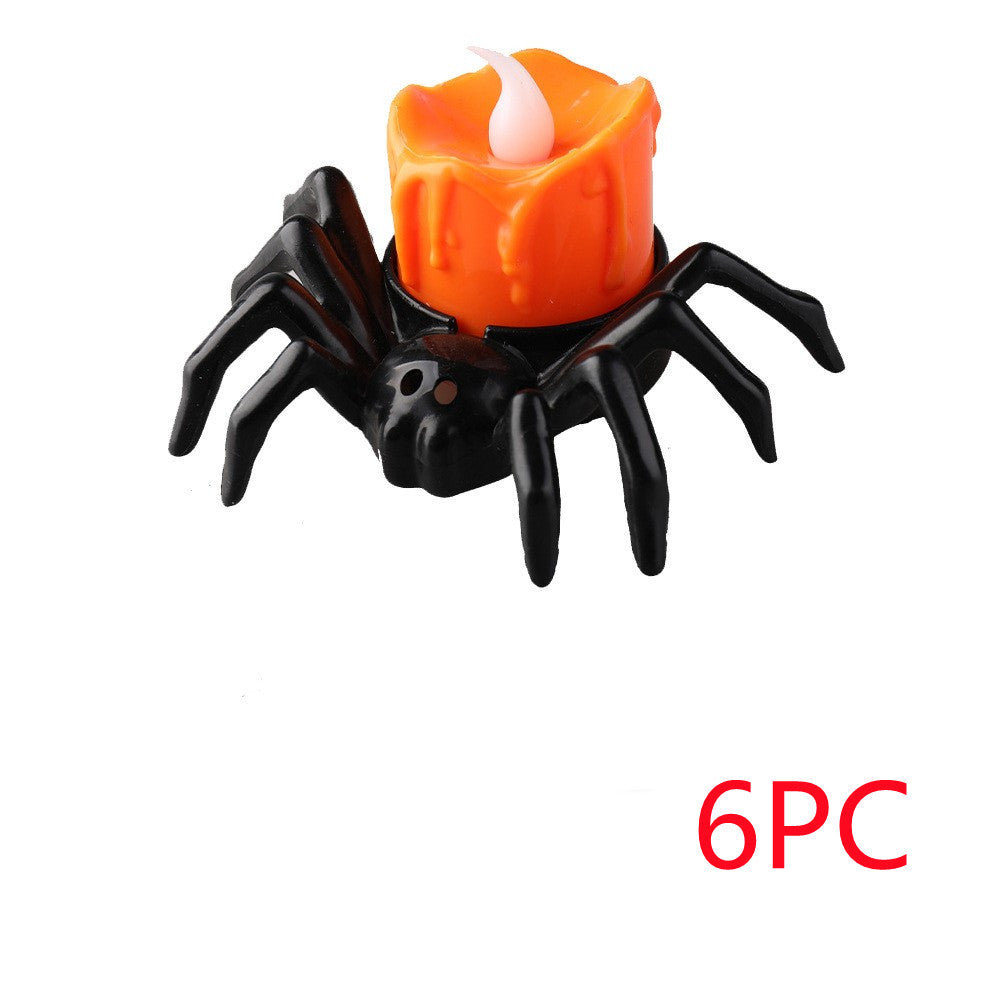 Morroween Spider Candlestick Ornament - lit in dark room