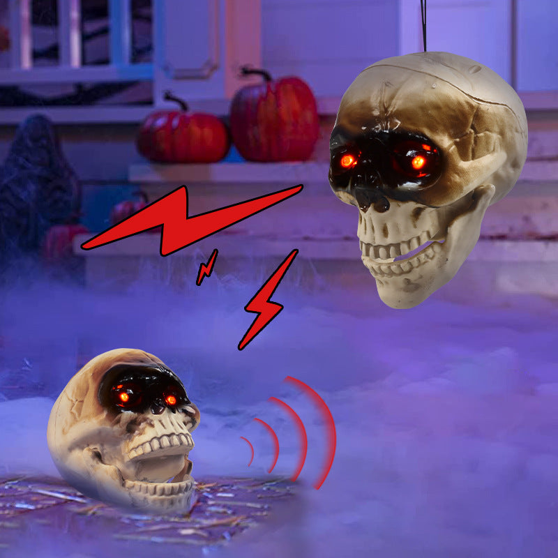 Morroween Animated Floating Skull - lit at night