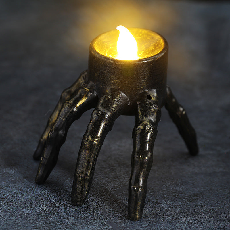 Morroween Skull Hand Lantern - lit in a dark room